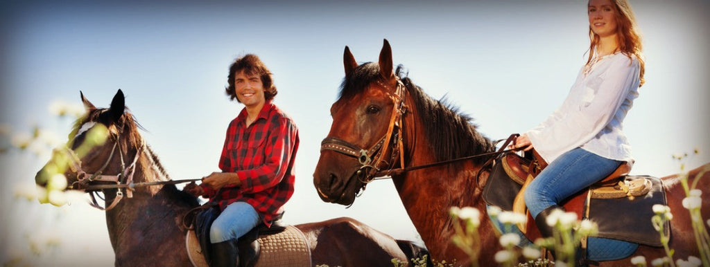 couple horseback riding