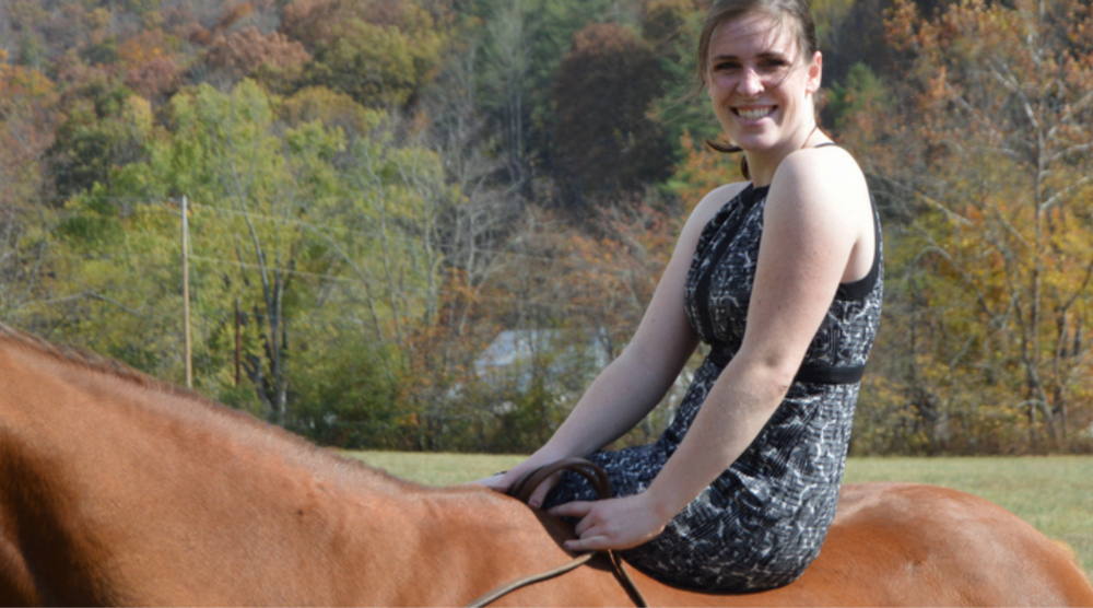  girl sitting on horse
