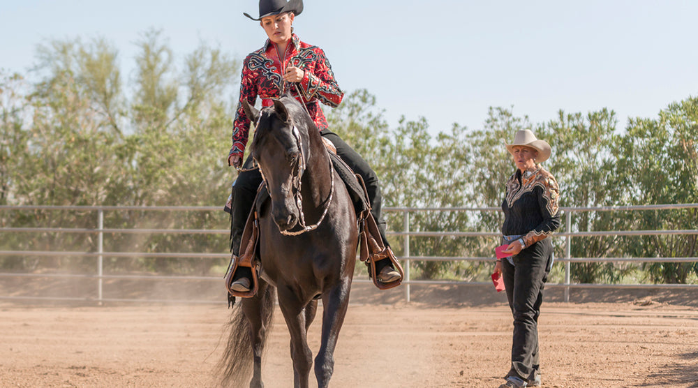  Western horseback rider with trainer